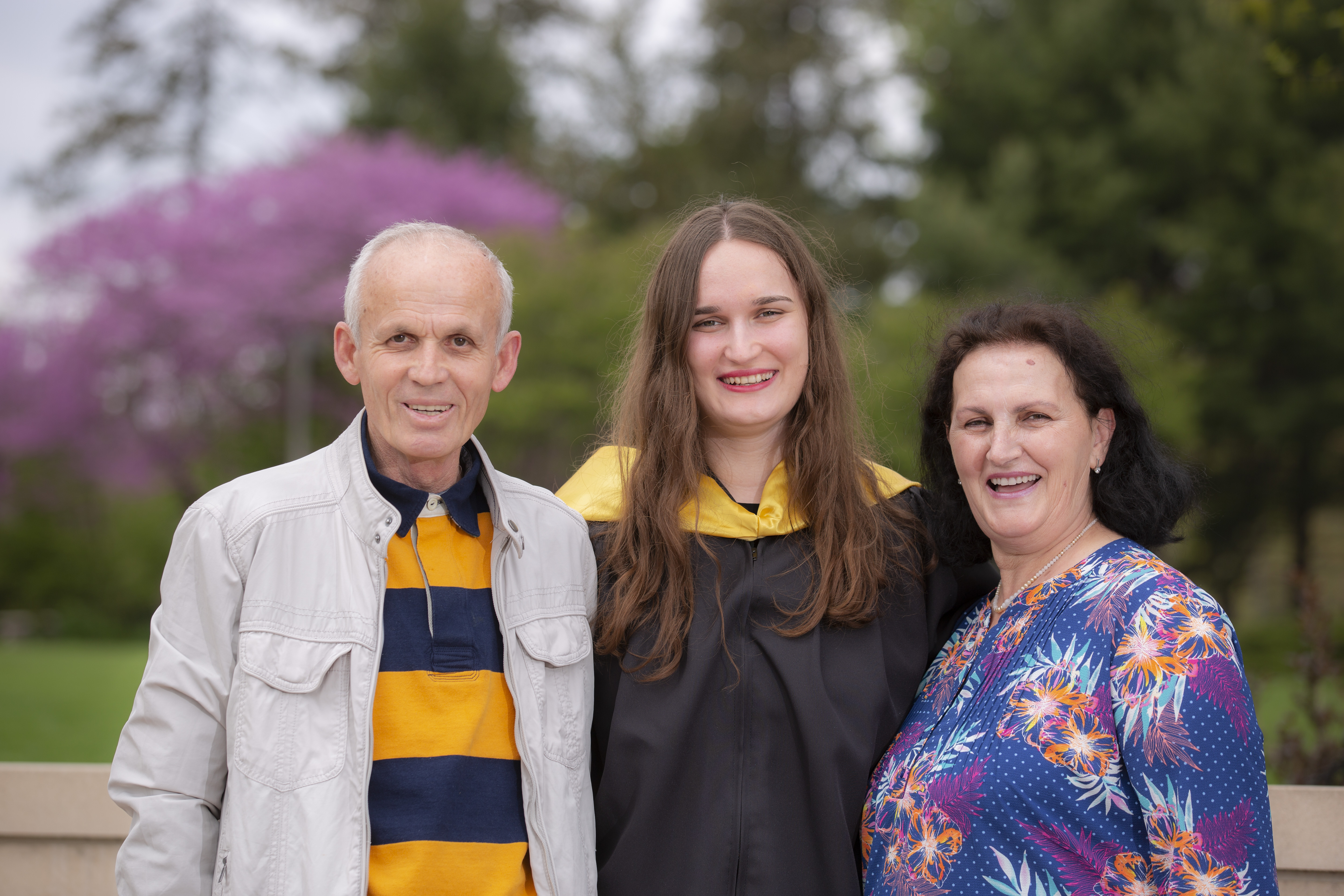 Albulena Basha with her parents