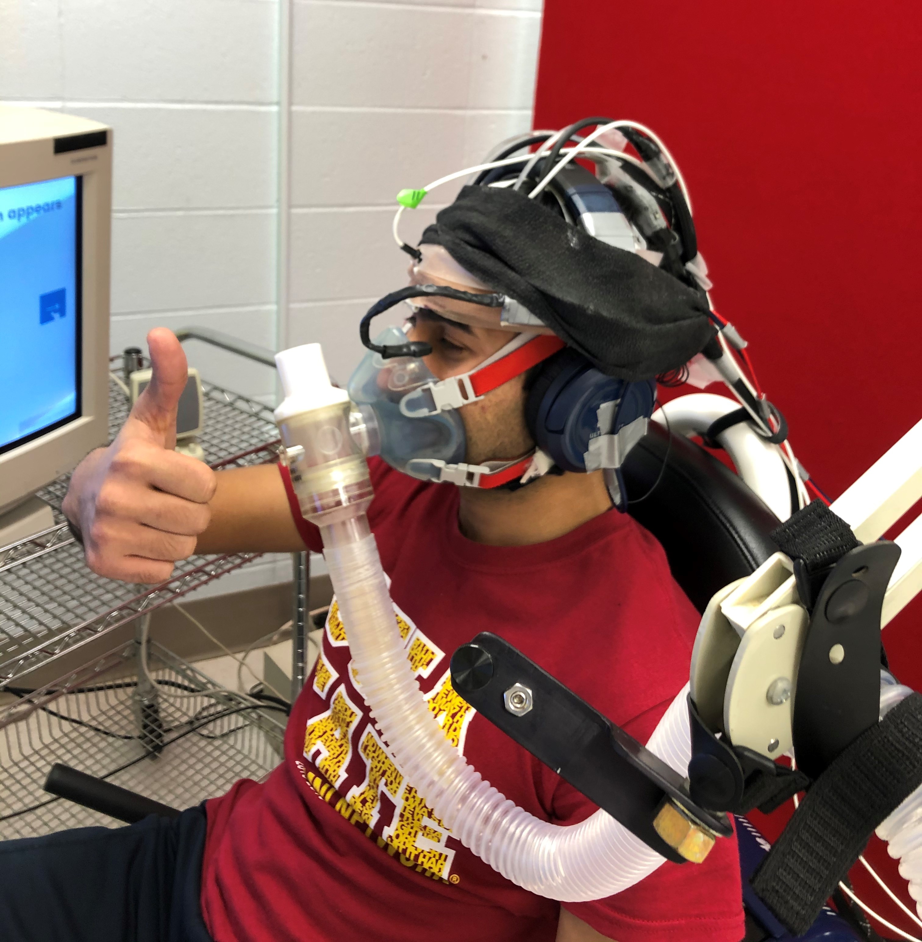 A study participant wears a device to measure brain activity during exercise